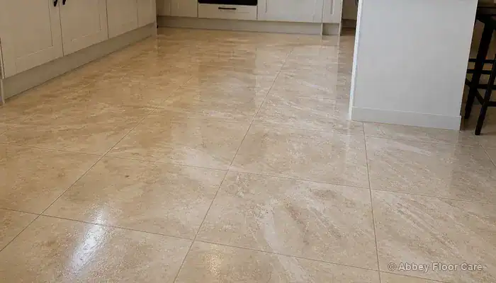 Porcelain tiles with cloudy residue film that repeated cleaning has not removed